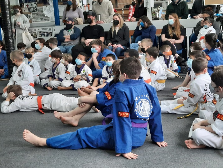 Dojo tournament - the kids watch an advance kata competition