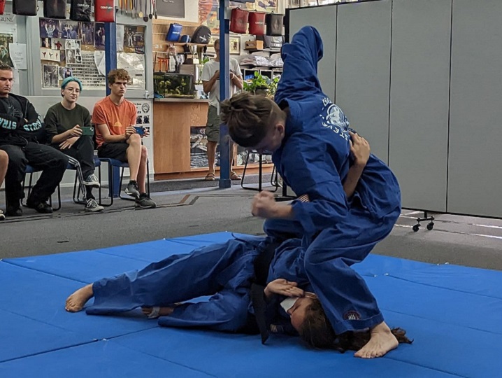 Sensei Mowry demonstrates their self-defense during their third degree test.